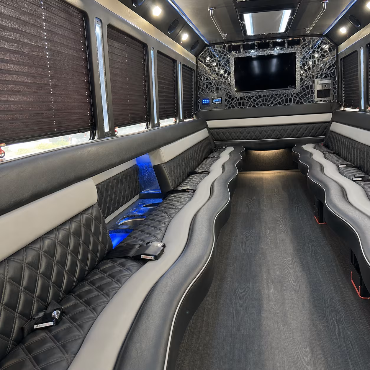 Wedding guests seated inside a party bus serving Henderson